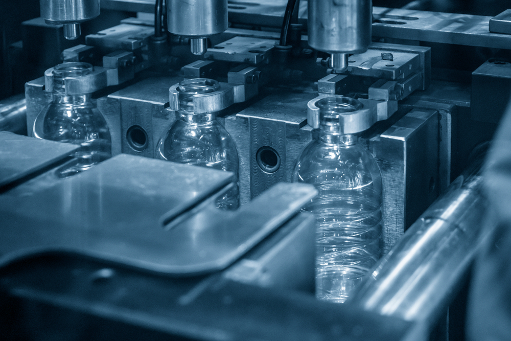 PET Bottles in an Automatic Blowing Mold Process